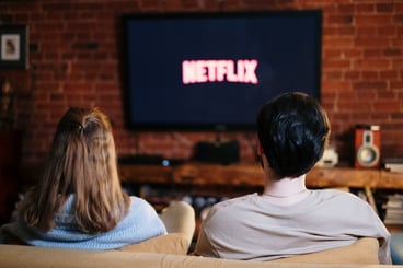 Couple on date watching Netflix